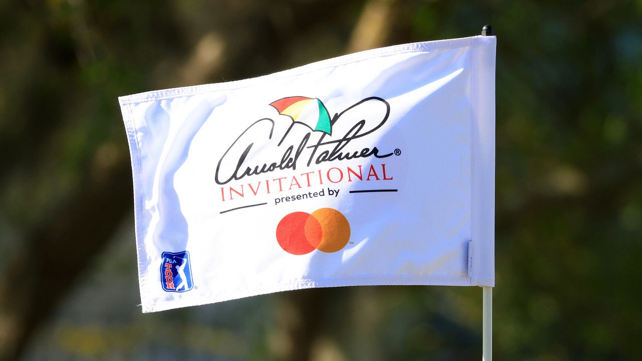 A flag showing the umbrella logo at the Arnold Palmer Invitational