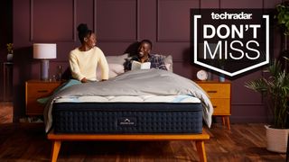 DreamCloud flash sale - a couple on a DreamCloud mattress