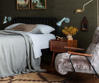 A bedroom filled with curated pieces of furniture