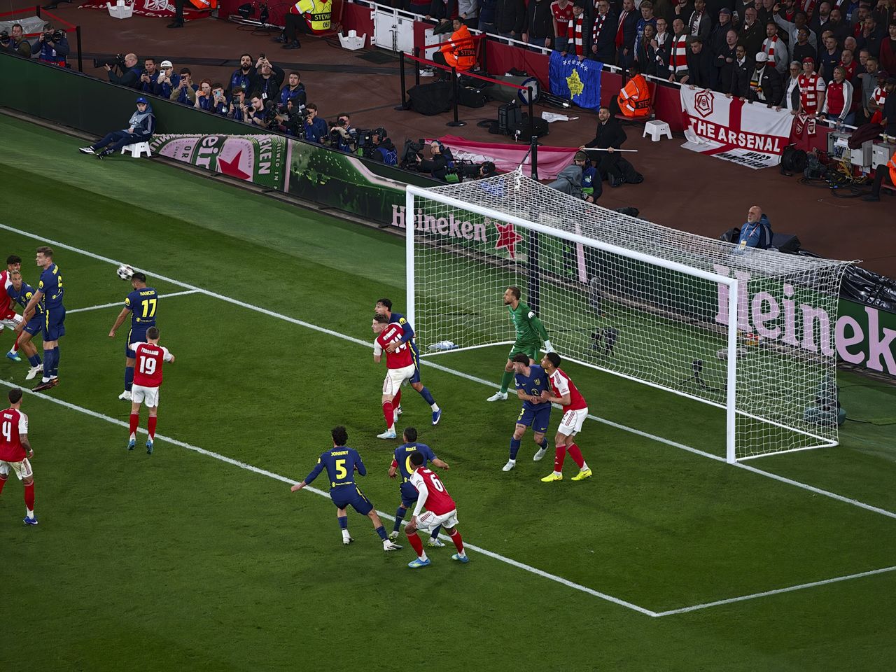 Action photos during a Champions League soccer match at Arsenal's Emirates stadium, taken with the Oppo Find X9 Ultra and teleconverter lens