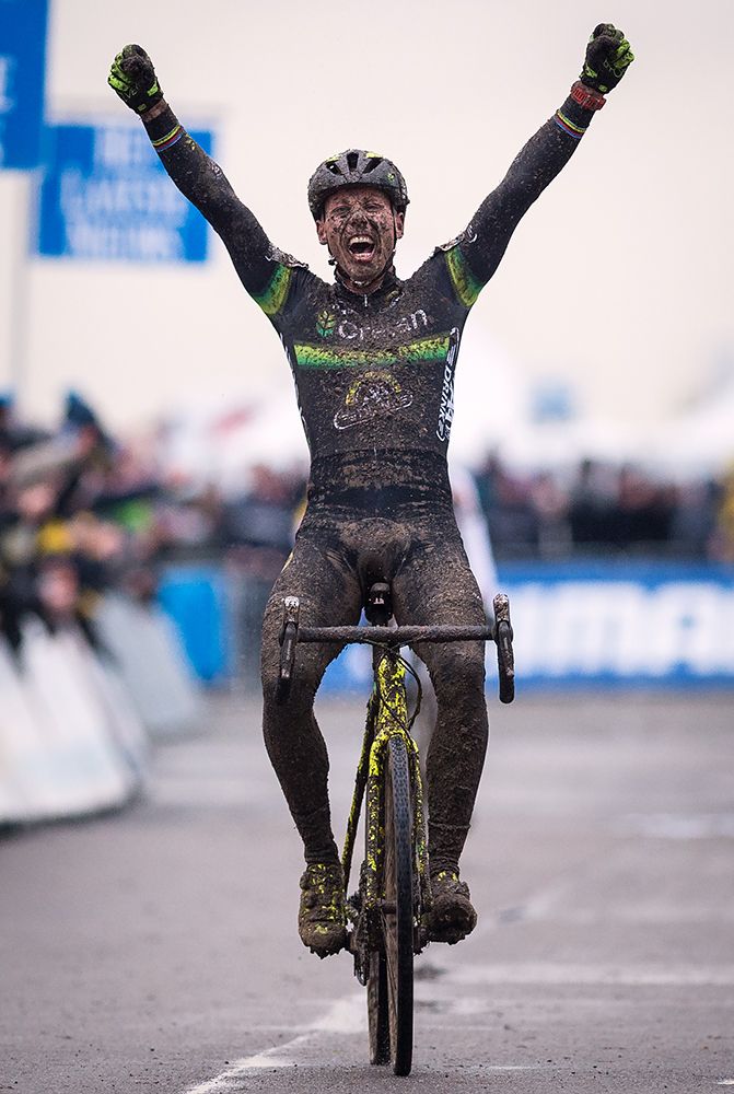 Sven Nys raises his arms in celebration