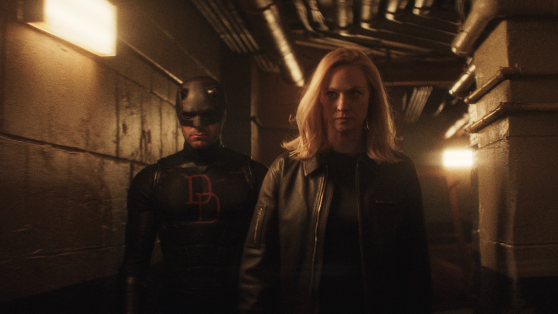 Charlie Cox and Deborah Ann Woll as Daredevil and Karen Page in Daredevil: Born Again season 2