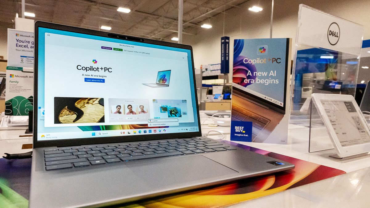 A Dell Inspiron 14 AI PC pictured inside a Best Buy store on Black Friday in Pinole.