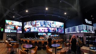 The new DraftKings Sportsbook at del Lago, a 6,000-square-foot space offering sports fans an innovative, high-tech sports betting experience, features LED video walls driven by an Analog Way Aquilon C+ processor. 