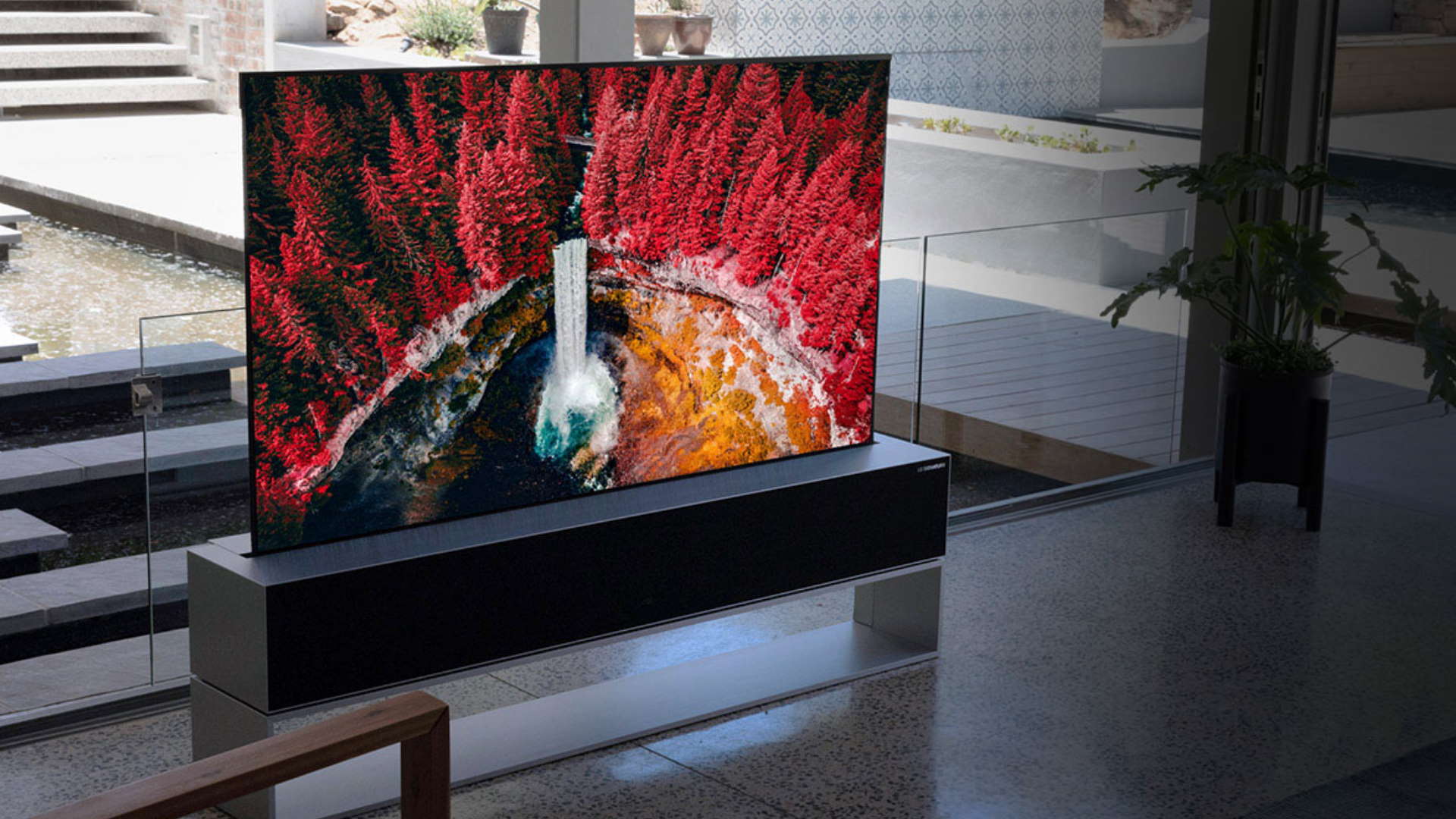 LG's finally rolling out the world's first rollable OLED TV. For ...