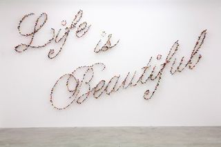 'Life is Beautiful' work features hundreds of knives stabbing the walls
