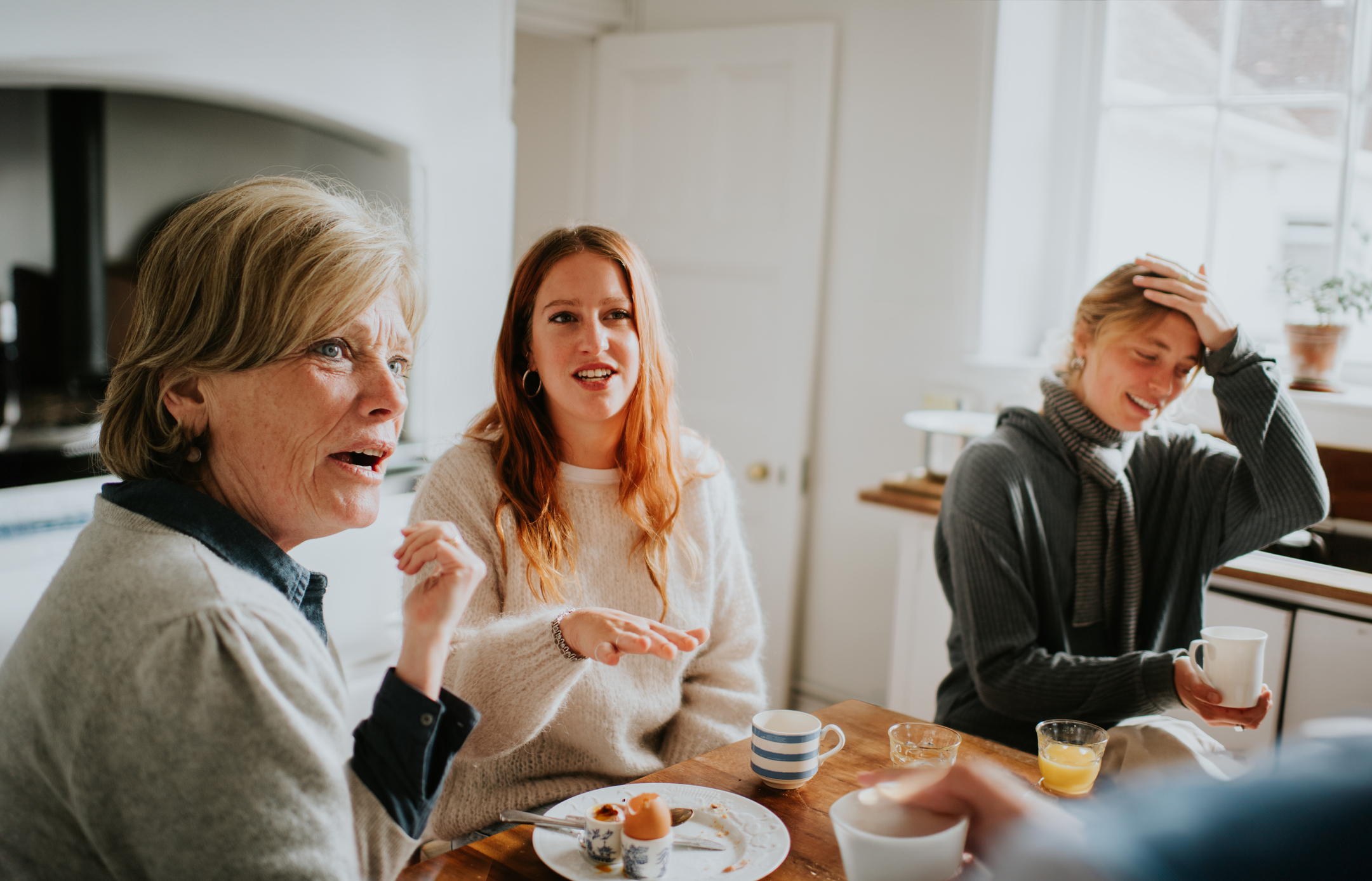 Family around a table discussing inheritance tax
