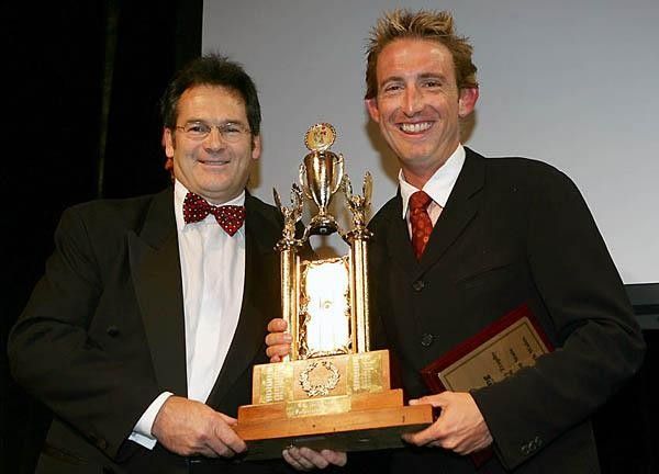 NSW cycling president Kerry Ruffels accepts the Norm Gailey Trophy.