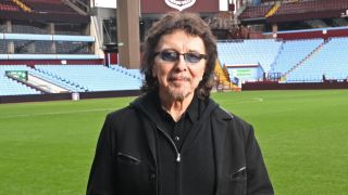 Tony Iommi standing in an empy Villa Park