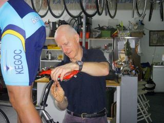 Steve makes some adjustments to a rider's seat positioning. A couple of milimetres either way can make a big difference.