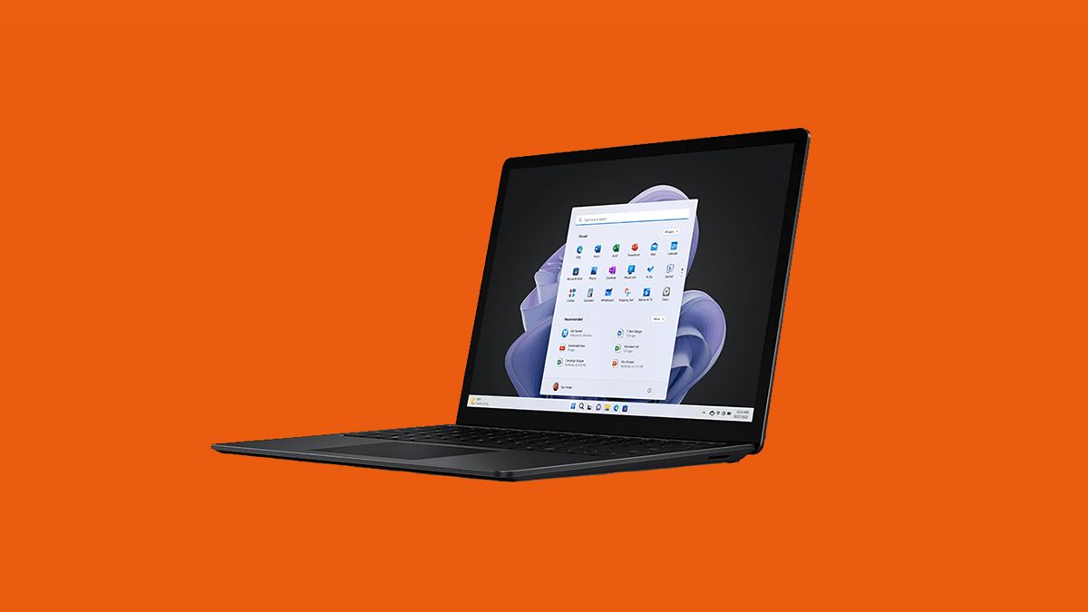 The Surface Laptop 5 on an orange background. 