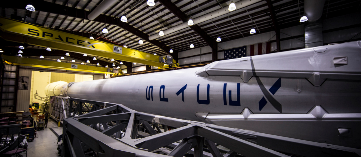 A SpaceX Falcon 9 rocket equipped with landing legs is seen in this image from the private spaceflight company&#039;s website. SpaceX will attempt to land the first stage of its Falcon 9 rocket on an ocean platform on Feb. 8, 2015 after launching the Deep Spac