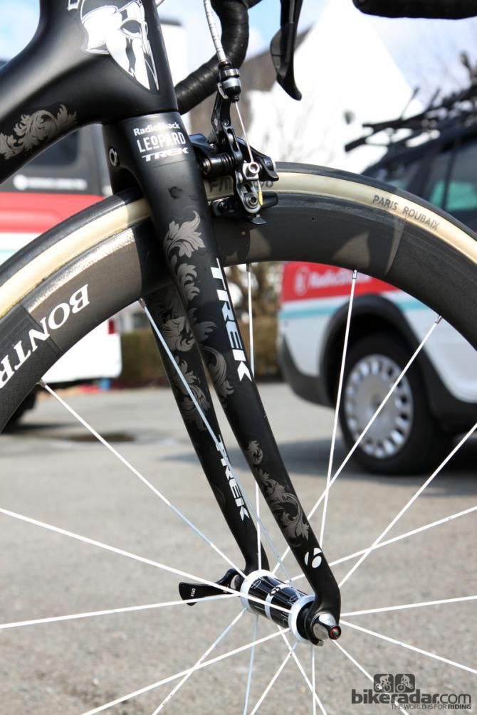 The Trek Domane 6-Series fork blades feature an exaggerated rake to help promote flex over rough surfaces. Backswept dropouts maintain a standard rake, though.