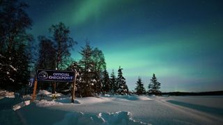 The northern lights in Alaska at an Iditarod MTB rece check point