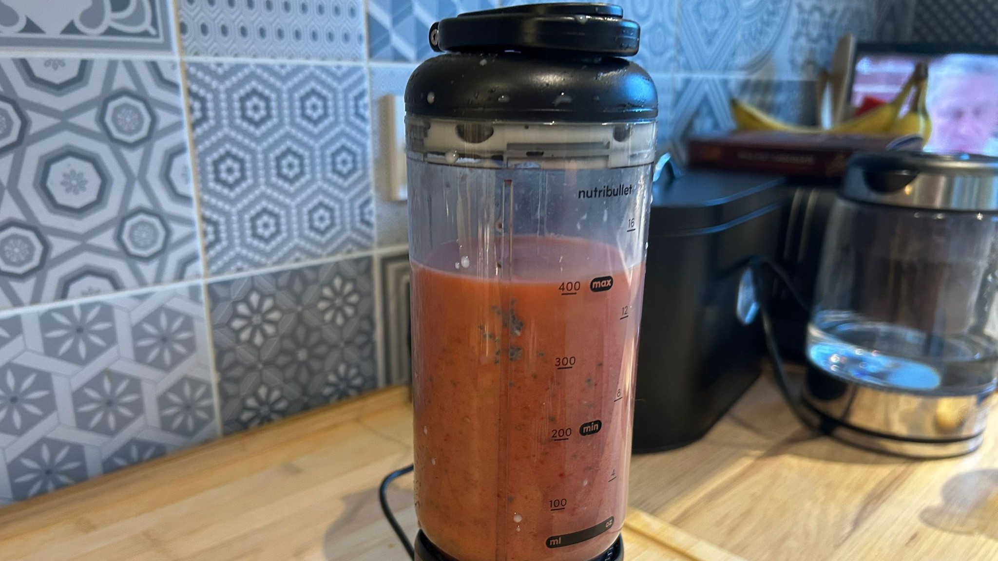 Nutribullet Flex blender with finished strawberry banana smoothie