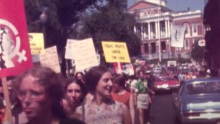 Protestors marching in 9 to 5: The Story of a Movement