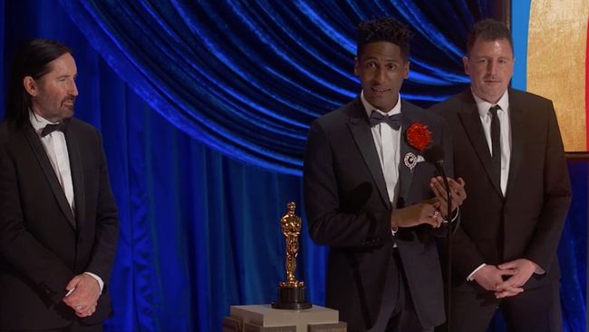 Trent Reznor, Jon Batiste, and Atticus Ross accept the Oscar for best original score for 'Soul'
