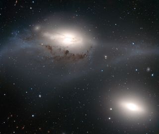 This striking image, taken with ESO's Very Large Telescope, shows a beautiful yet peculiar pair of galaxies, NGC 4438 (top) and NGC 4435, nicknamed The Eyes.