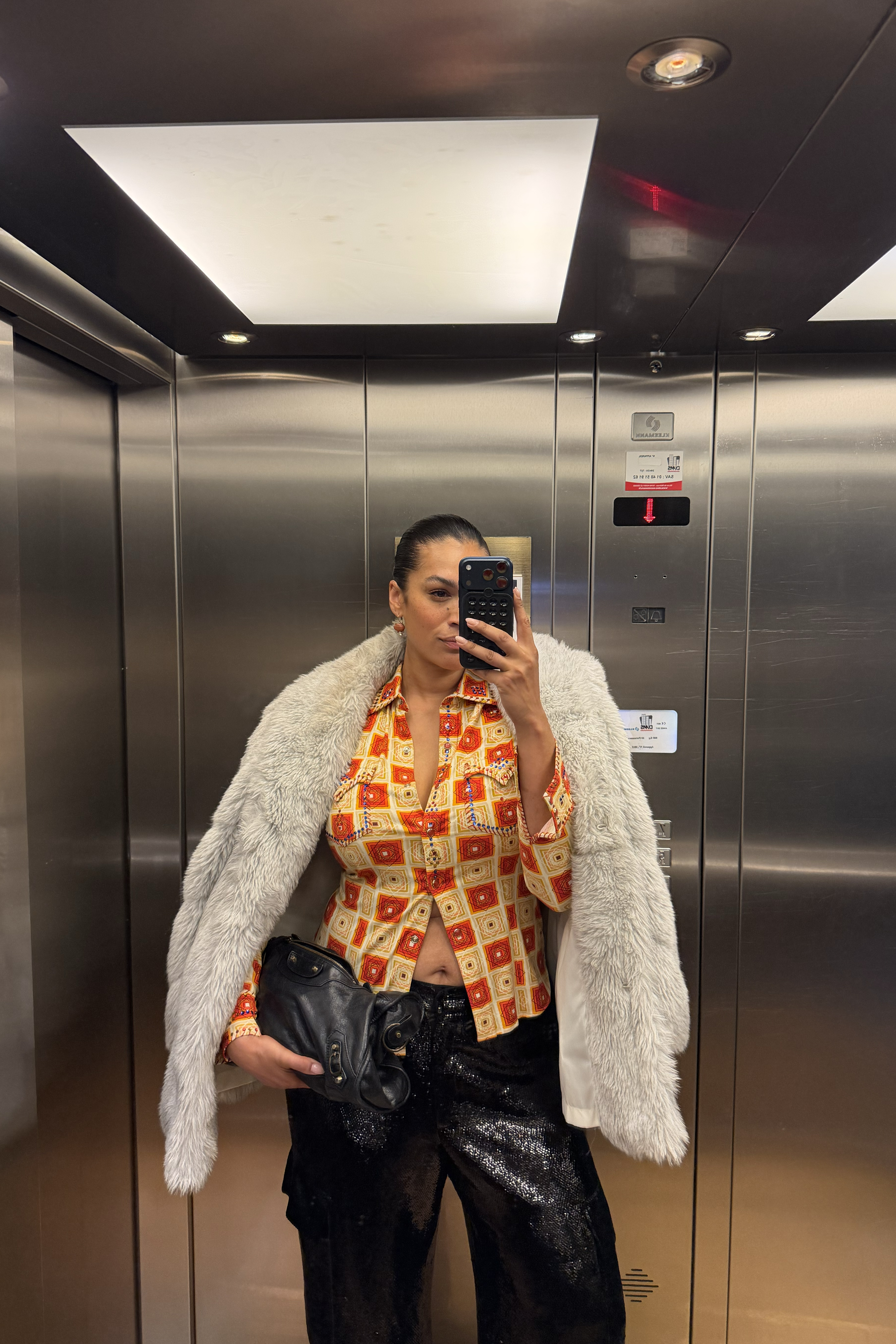 Jennifer Atilemile wearing clothes.