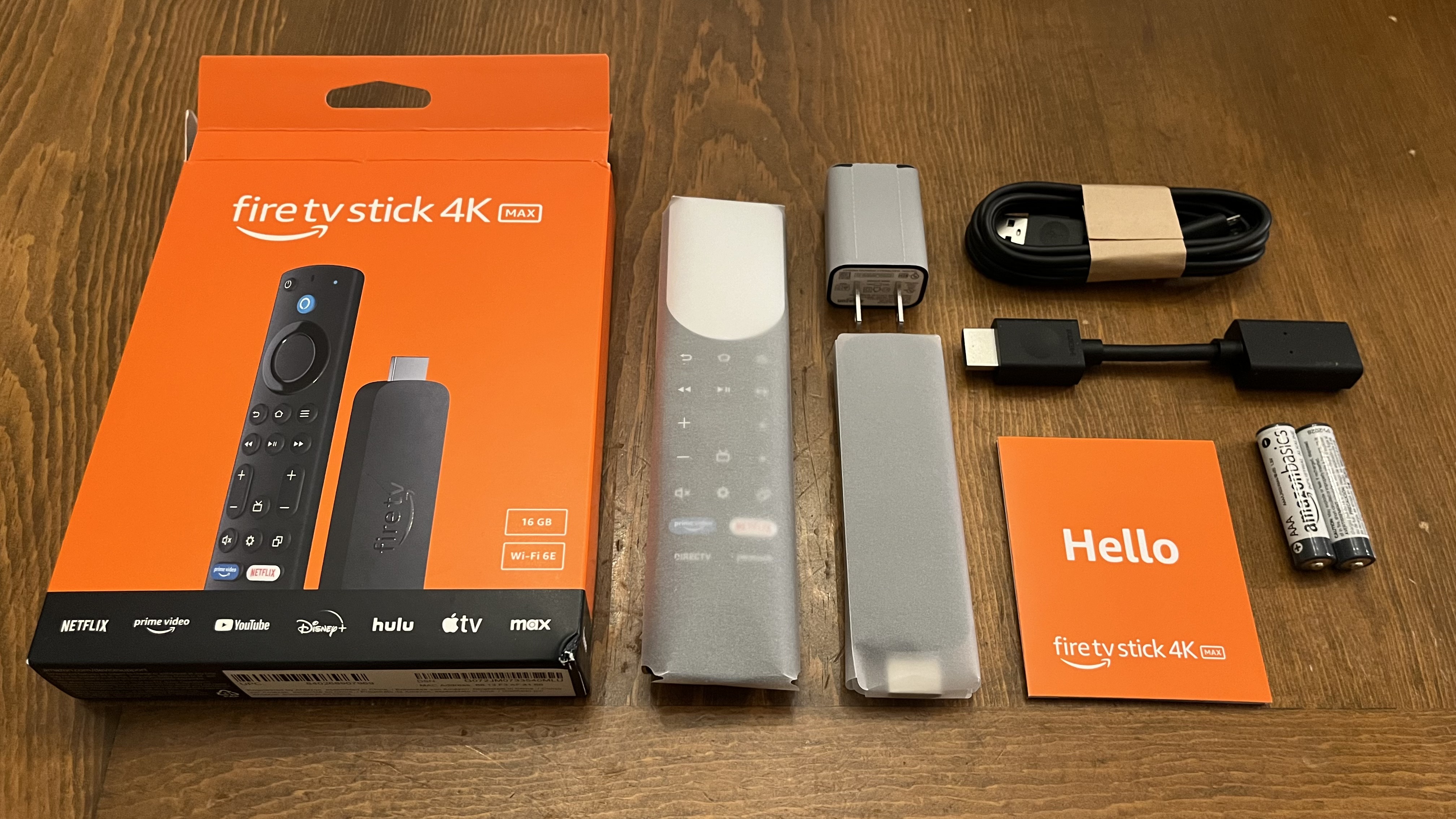 Amazon Fire TV Stick 4K Max (2023) package contents on wood table