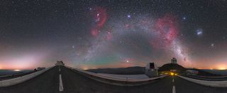 Colorful cosmic "fireworks" decorate the night sky over the La Silla observatory in Chile in this gorgeous image by the European Southern Observatory's resident astrophotographer Petr Horálek. Above the Milky Way and to the left are two nebulas that appear to form a question mark in the sky: an arc known as Barnard's Loop and the nearly-circular Angelfish Nebula right below it. These two nebulas are part of the Orion Molecular Cloud Complex.