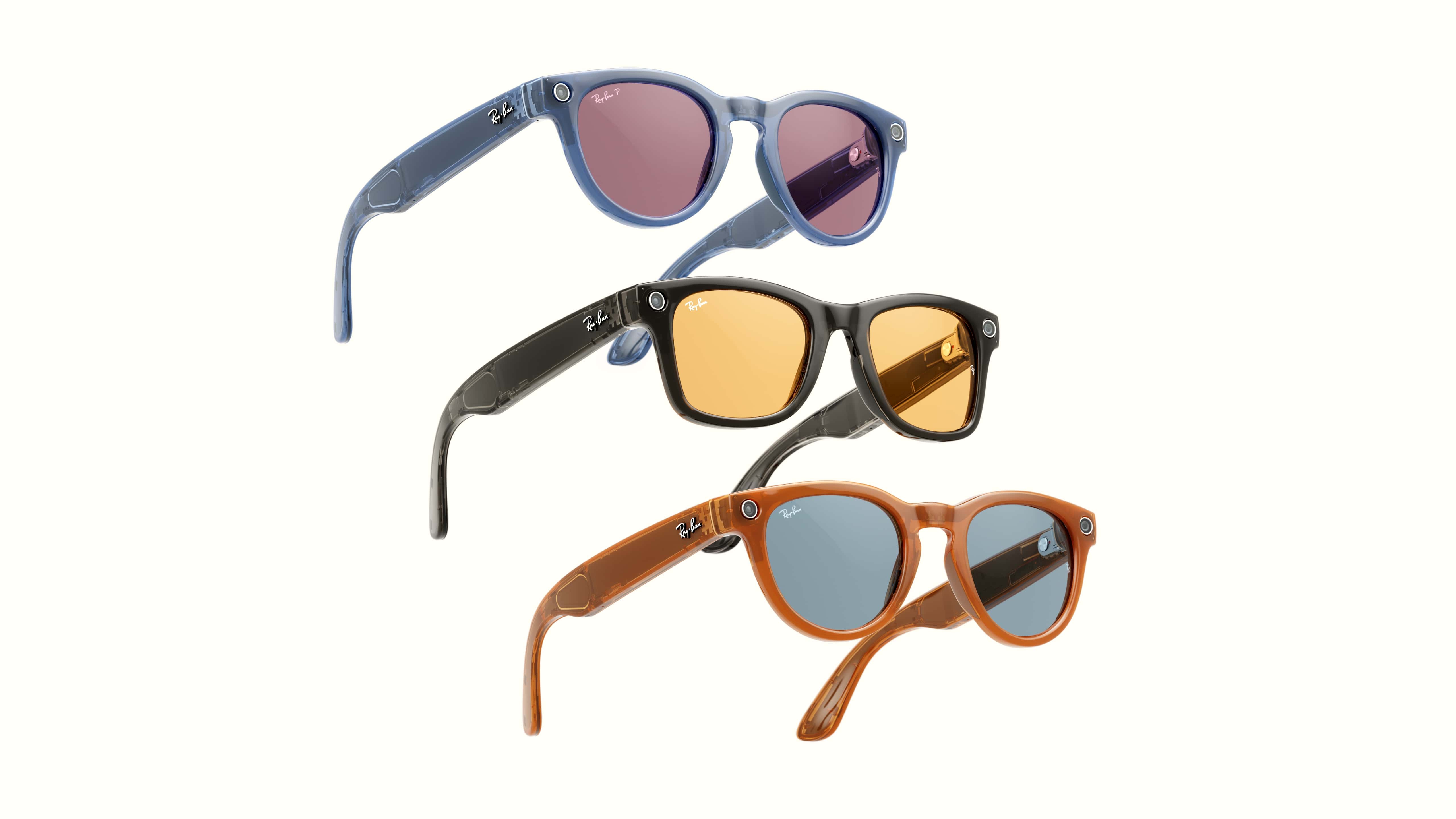 Three pairs of RayBan Meta Smart Glasses, one is blue with purple lenses, one is black with yellow lenses and the last is orange with blue lenses