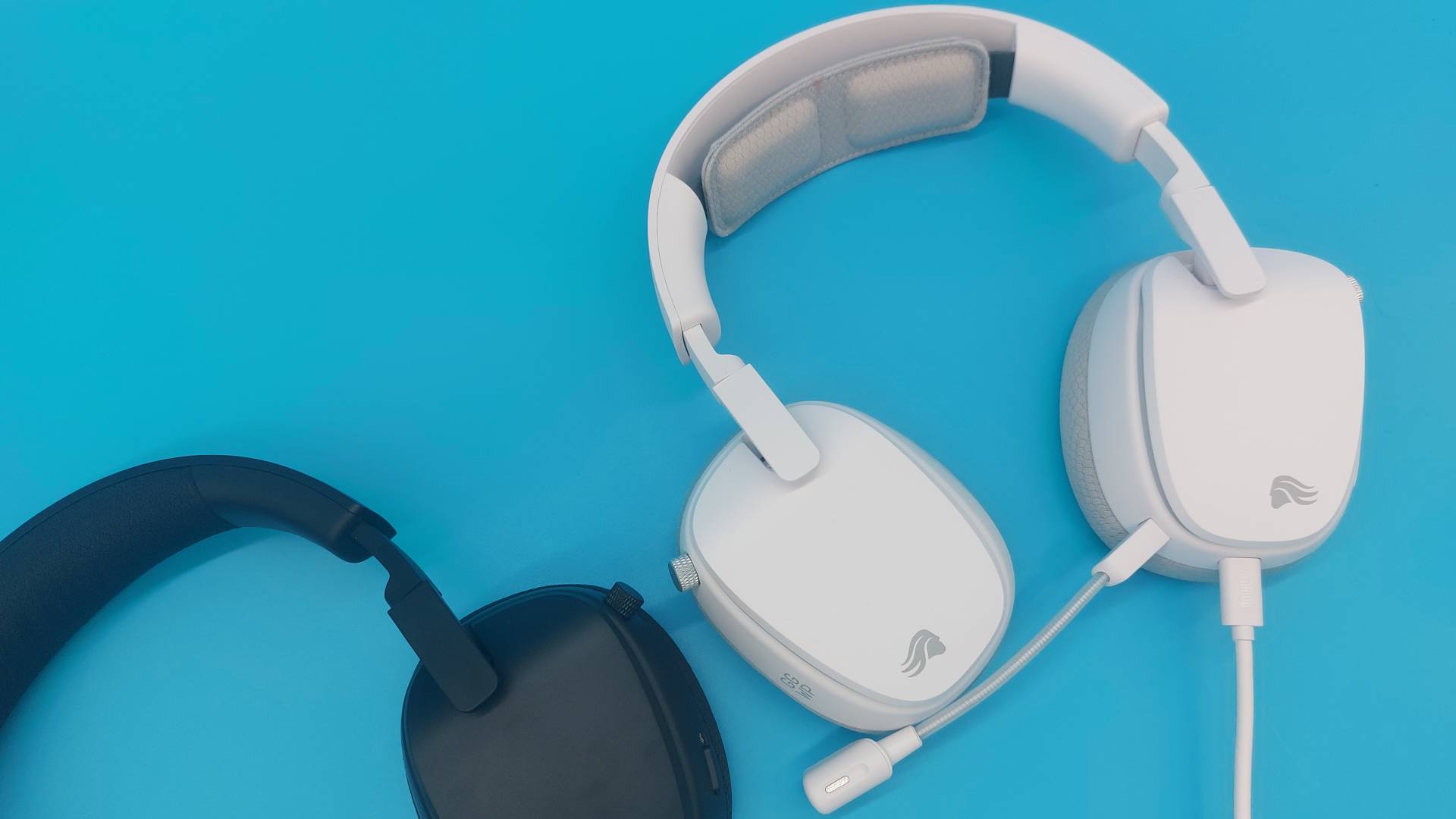 The Glorious GHS Eternal and GHS Eternal RGB wired gaming headsets in white and black, seen from various angles.