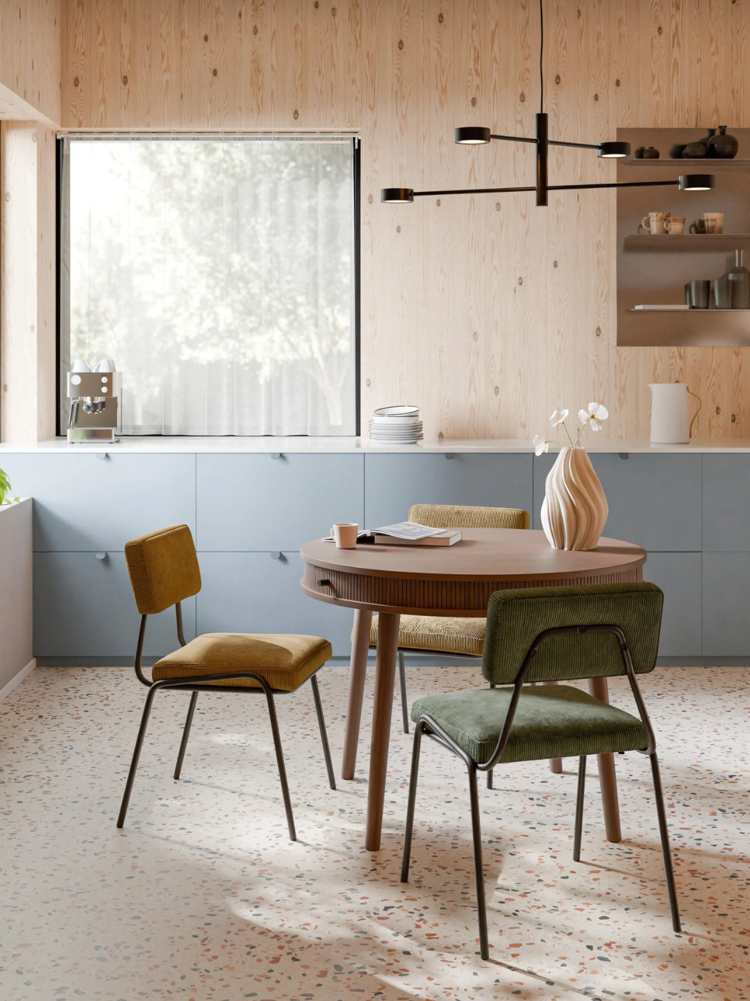 A wooden dining table with drawers