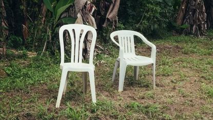 the monobloc chair, as pictured on the cover of bad bunny's album Deb&iacute; Tirar M&aacute;s Fotos