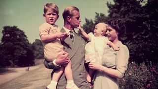 A young Queen Elizabeth and Prince Philip with Prince Charles and Princess Anne as children