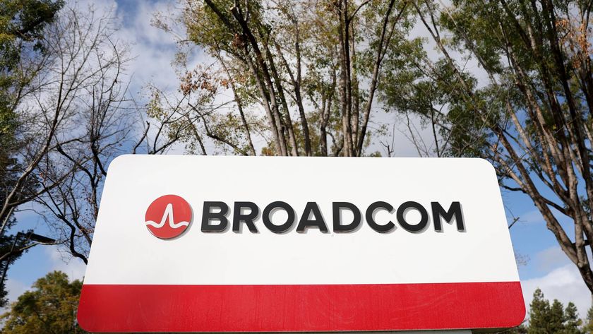 Broadcom sign with trees and the sky in the background