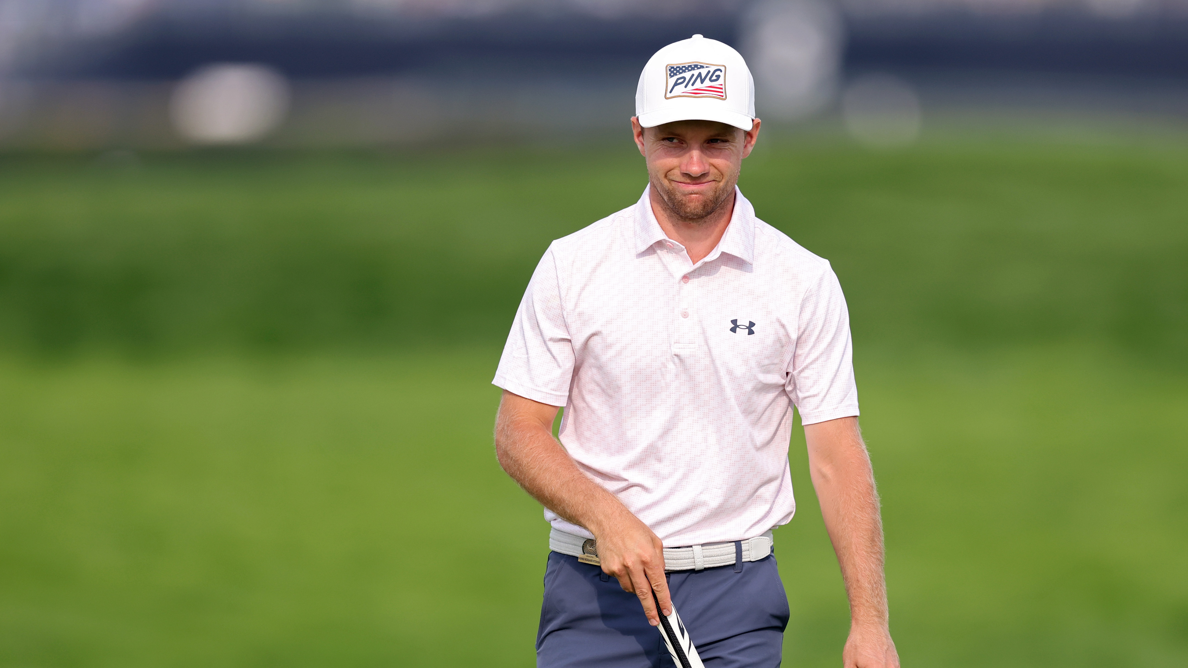 Rasmus Neergaard-Petersen smiling on a green at the 2025 US Open