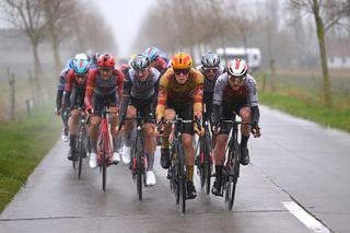 DE PANNE BELGIUM MARCH 22 LR Stian Fredheim of Norway and UnoX Pro Cycling Team and Simone Consonni of Italy and Team Cofidis compete in the breakaway during the 47th Minerva Classic Brugge De Panne 2023 a 211km one day race from Brugge to De Panne on March 22 2023 in De Panne Belgium Photo by Luc ClaessenGetty Images