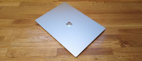 Microsoft Surface Laptop 5 review; a closed laptop on a wooden table
