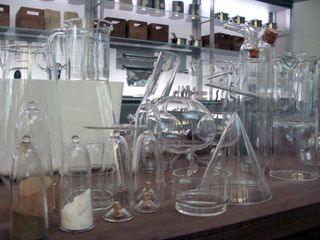 A large collection of scientific glassware