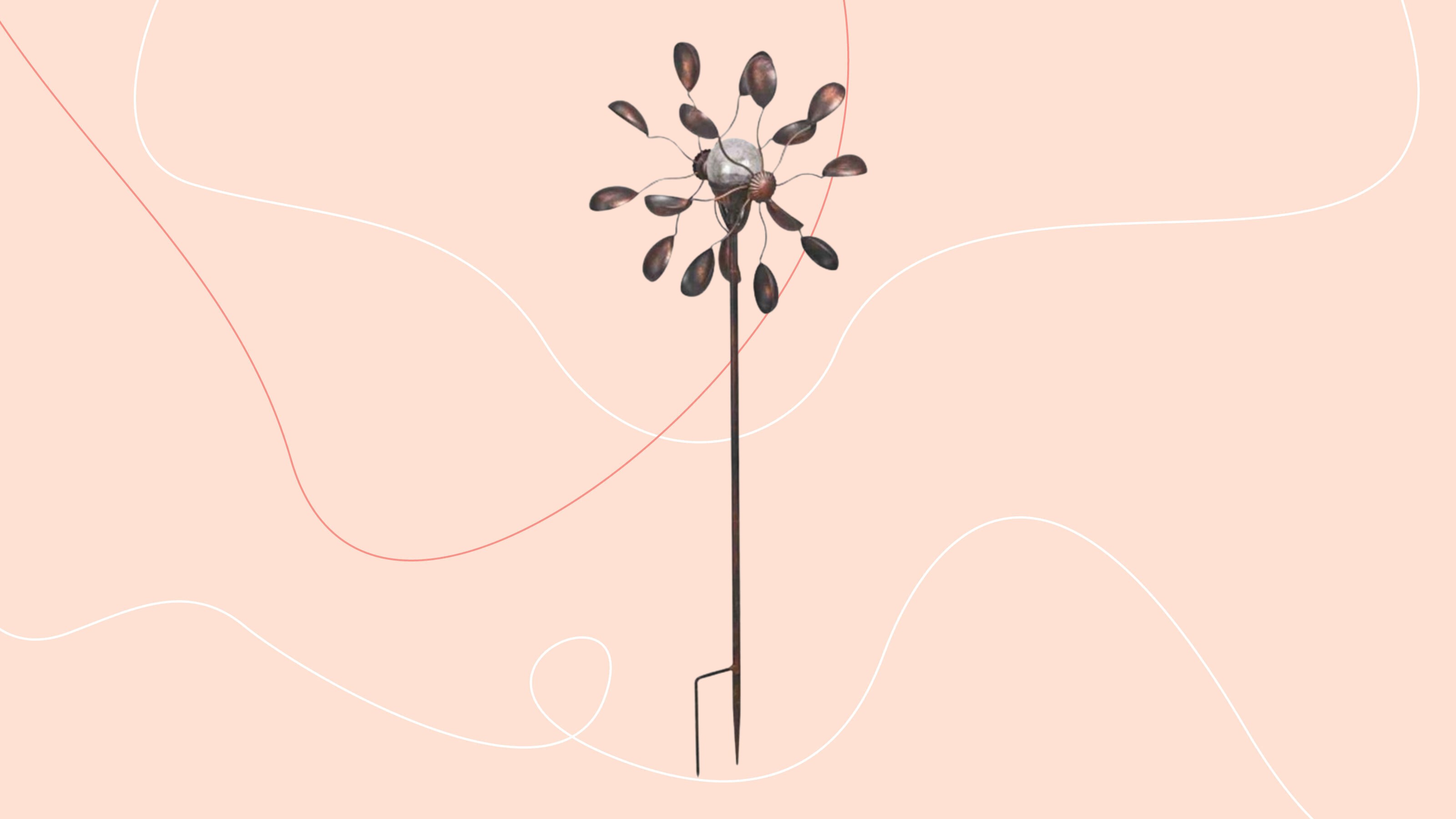 Gemini Wind Spinner with Solar Crackle Globe on a pink background