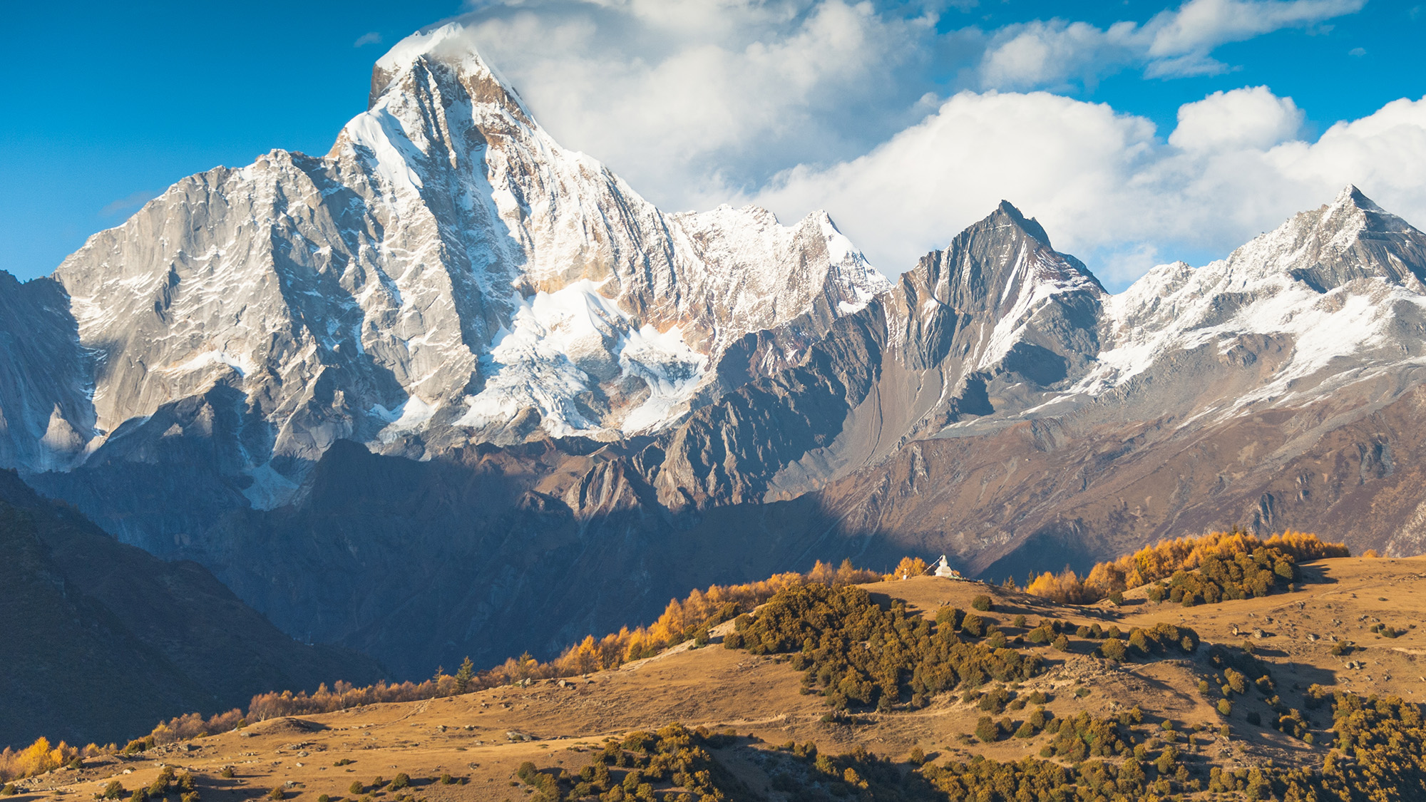 A view of a snowy mountainous landscape.