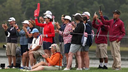 Fans cheer along the course during the first round of the Solheim Cup 2024 at Robert Trent Jones Golf Club on September 13, 2024 in Gainesville, Virginia.