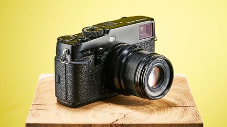 The Fujifilm X-Pro3 against a yellow background