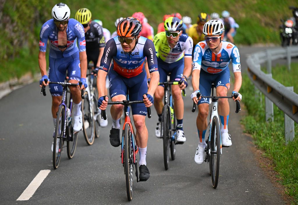 EIBAR SPAIN APRIL 06 LR Christopher JuulJensen of Denmark and Team Jayco AlUla and Oscar Onley of The United Kingdom and Team dsmfirmenich PostNL compete in the breakaway during the 63rd Itzulia Basque Country 2024 Stage 6 a 1378km stage from Eibar to Eibar UCIWT on April 06 2024 in Eibar Spain Photo by Tim de WaeleGetty Images