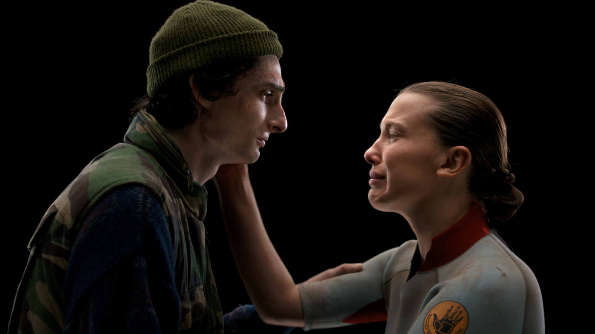 Finn Wolfhard as Mike and Millie Bobby Brown as Eleven in Stranger Things season 5