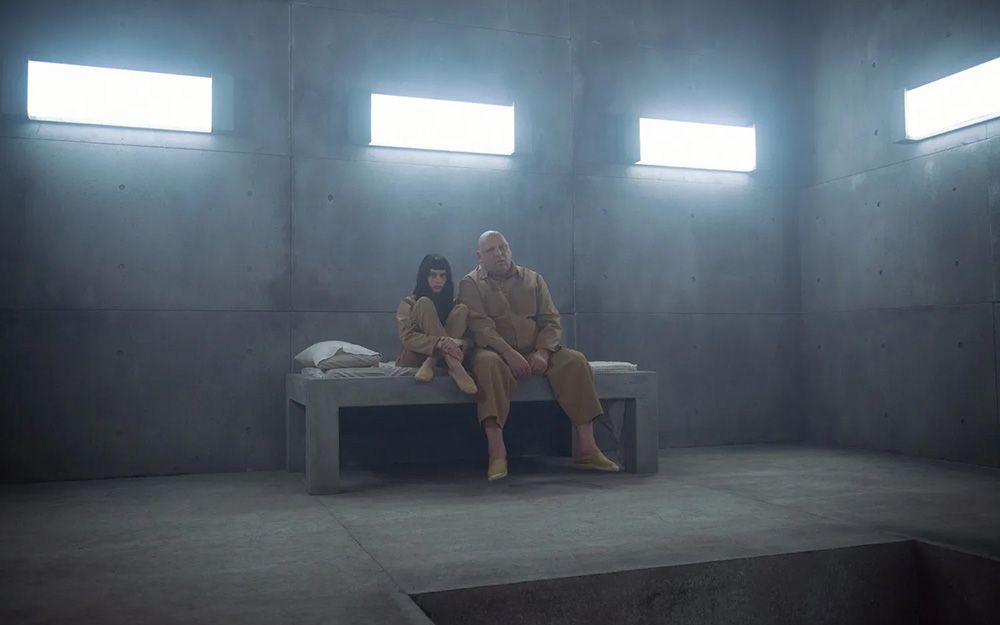 A movie still showing two prisoners in a cell