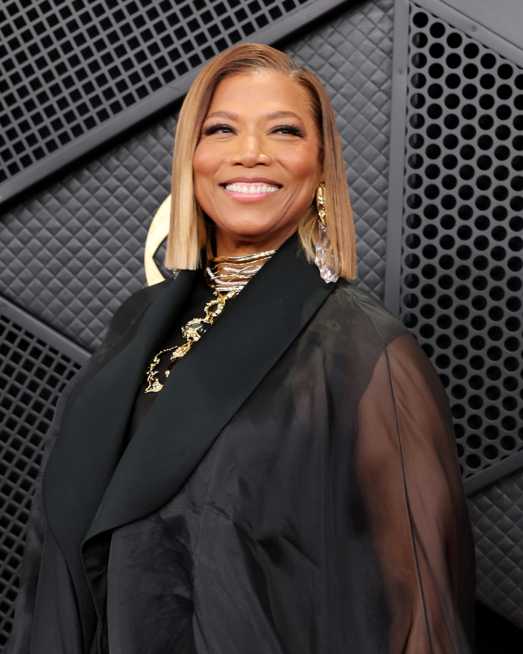 Queen Latifah with bronzed skin and a blonde bob at the 2026 Grammys Awards