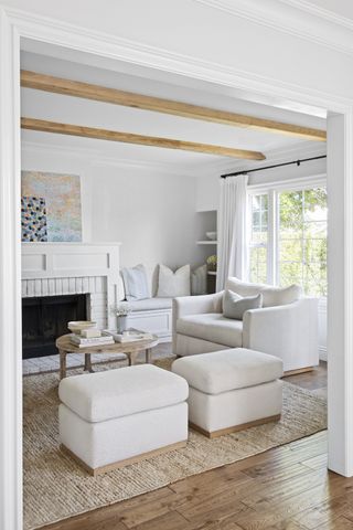 small white living room with white sofa by Victoria Holly Interiors