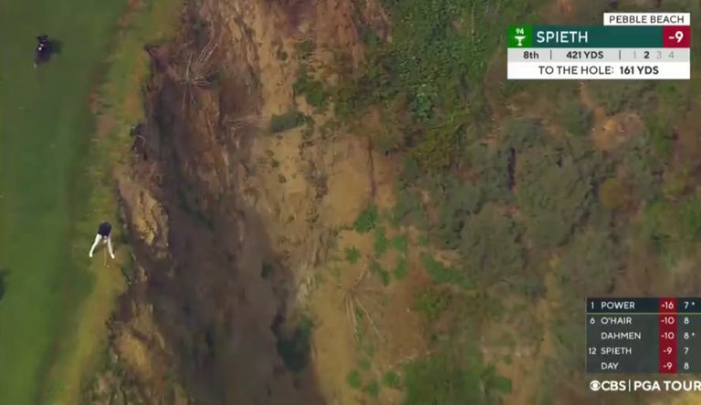 Spieth hits a shot by a cliff
