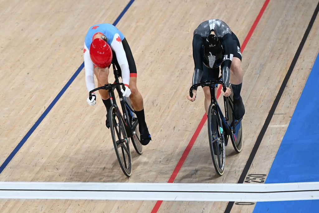 Canadas Kelsey Mitchell L sprint with New Zealands Ellesse Andrews in a heat of the womens track cycling sprint 18 finals during the Tokyo 2020 Olympic Games at Izu Velodrome in Izu Japan on August 7 2021 Photo by Greg Baker AFP Photo by GREG BAKERAFP via Getty Images