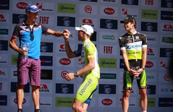 Koren steps up onto the podium to join Adriano Malori (Lampre) and Daryl Impey (GreenEdge)