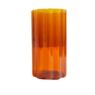 An orange rippled vase