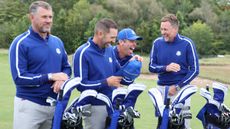 Lee Westwood, Paul Casey, Sergio Garcia and Ian Poulter share a joke at the 2021 Ryder Cup at Whistling Straits
