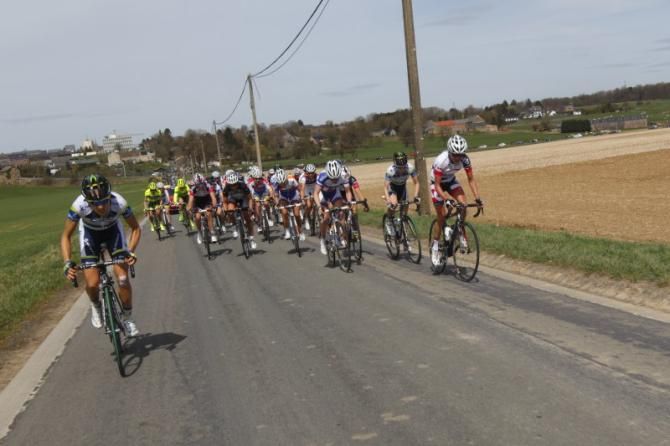 Aussies - Shara Gillow (Orica - AIS) attacks (left), but is marked by Carlee Taylor (Lotto Belisol Ladies) and watched by Tiffany Cromwell (Orica - AIS)